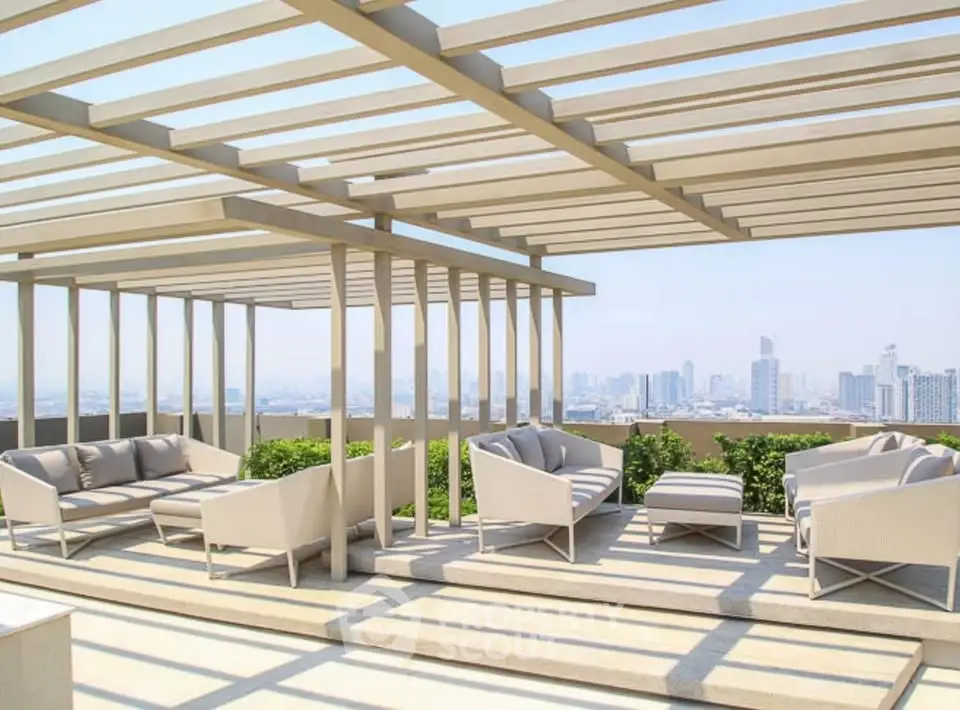 Stunning rooftop terrace with modern seating and panoramic city views.