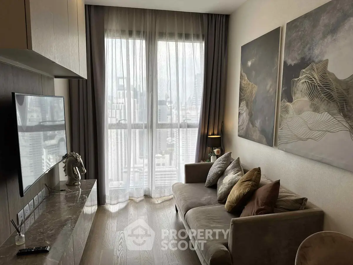 Stylish living room with city view, modern decor, and cozy seating area.