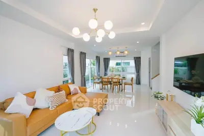 Spacious modern living room with elegant lighting and stylish furniture