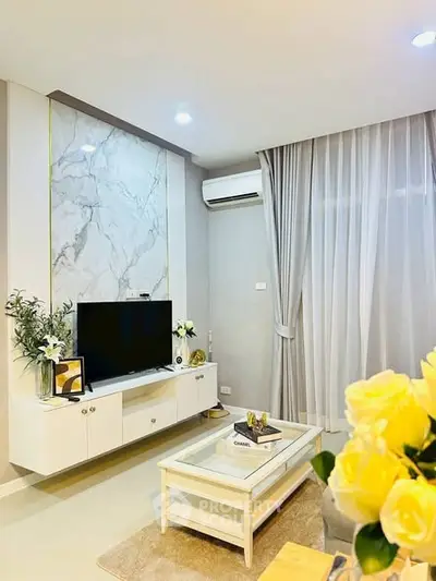 Stylish living room with modern decor and marble accent wall