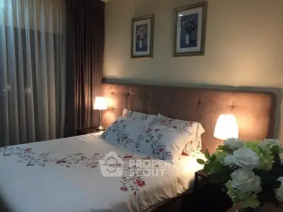 Cozy bedroom with elegant decor and soft lighting, perfect for relaxation.
