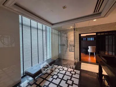 Luxurious modern interior with stylish seating and elegant flooring, perfect for sophisticated living.