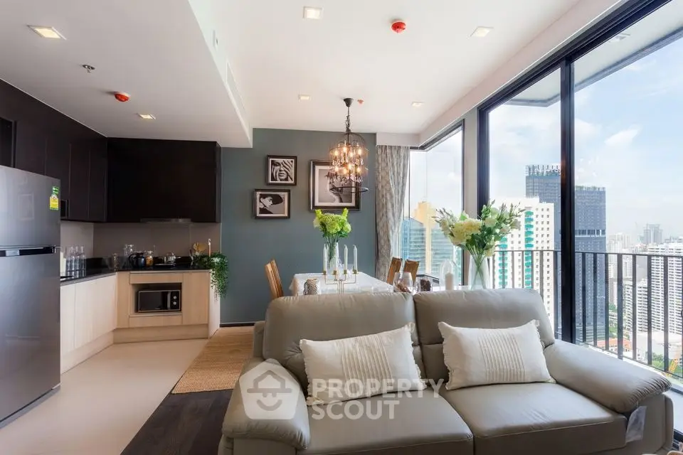 Luxurious open-plan living room with city view and elegant dining area in modern apartment.