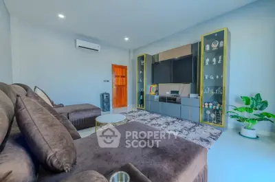 Spacious modern living room with plush seating and stylish decor