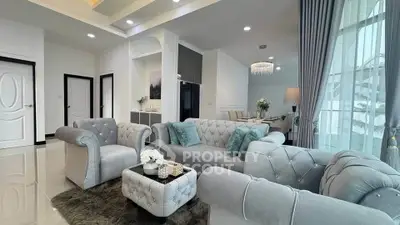 Luxurious modern living room with elegant gray sofas and chic decor