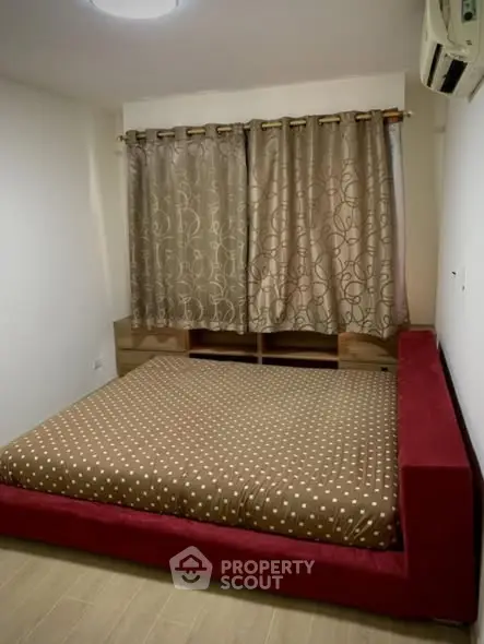 Cozy bedroom with modern decor and stylish curtains