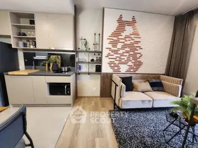 Modern living room with stylish decor and open kitchen layout