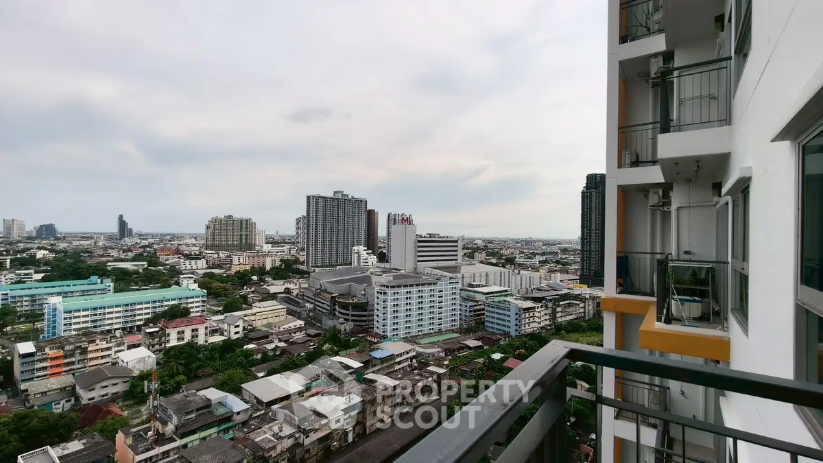 Stunning cityscape view from high-rise balcony in urban setting