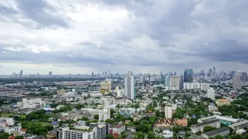 Stunning cityscape view with skyline and lush greenery, perfect for urban living enthusiasts.