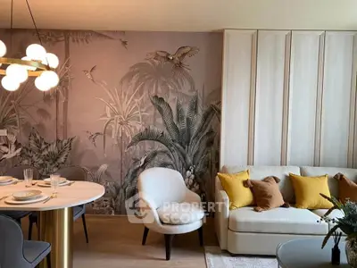 Stylish living room with tropical wallpaper and modern furniture, perfect for cozy gatherings.