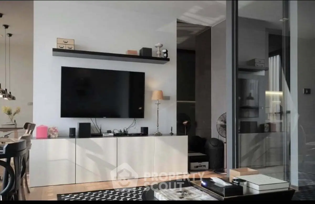 Modern living room with sleek TV setup and stylish decor