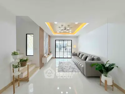 Modern living room with sleek design and natural light