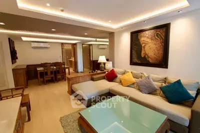 Spacious living room with modern decor and cozy seating area