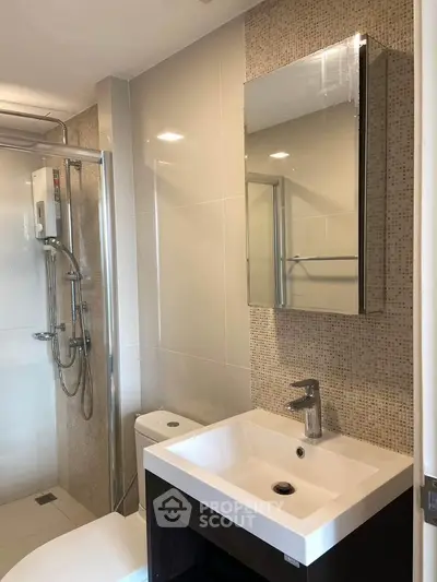 Modern bathroom with sleek fixtures and stylish tile design