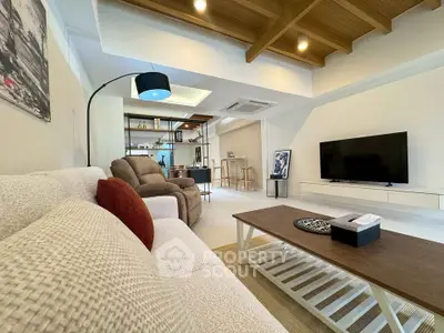 Spacious modern living room with cozy seating and stylish decor