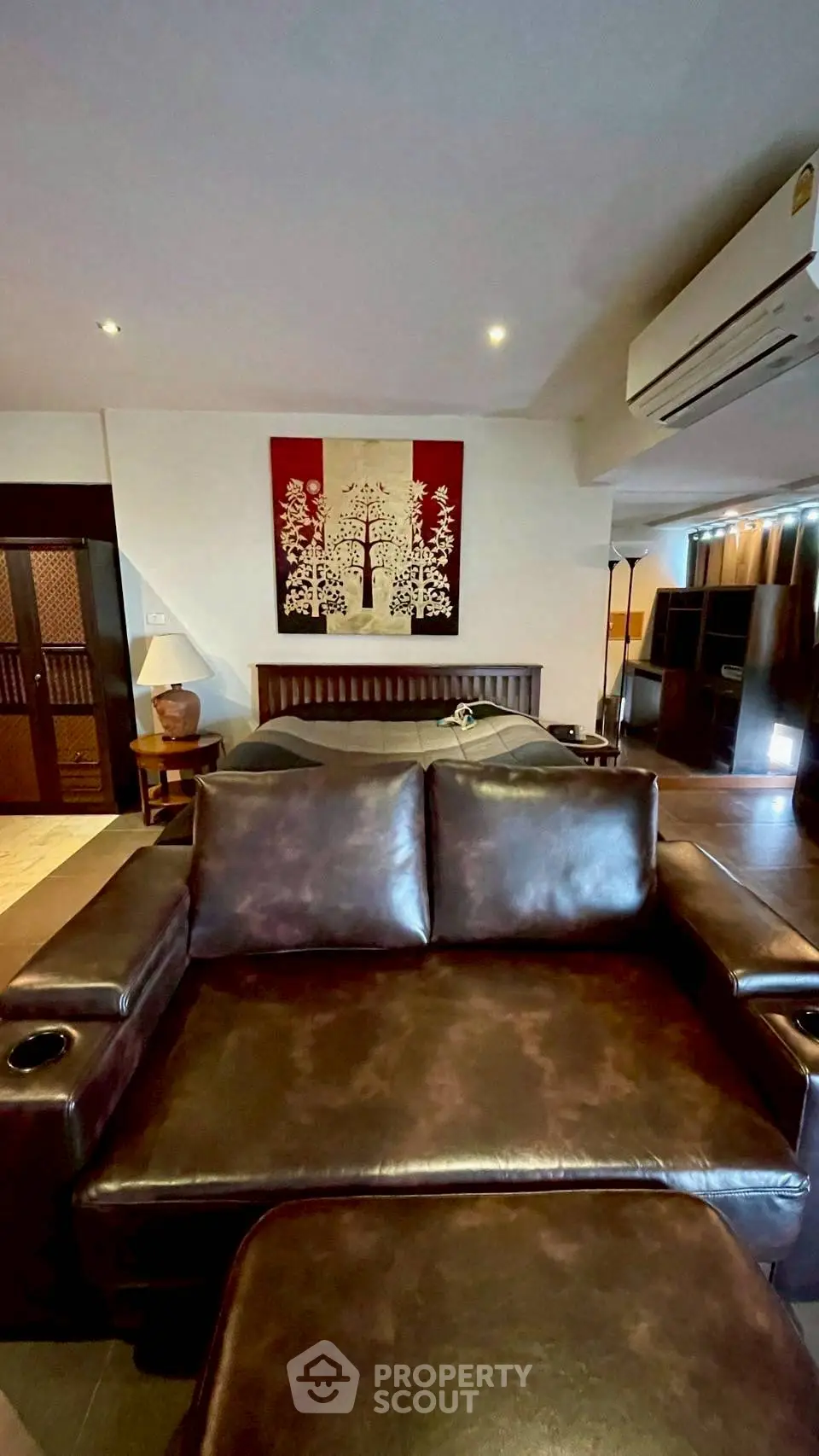 Luxurious living room with leather sofa and elegant decor