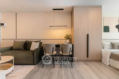 Modern living room with stylish furniture and cozy ambiance in a contemporary apartment.