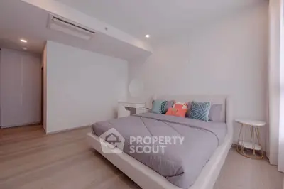 Modern bedroom with stylish decor and cozy ambiance