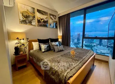 Luxurious bedroom with stunning city view and elegant decor