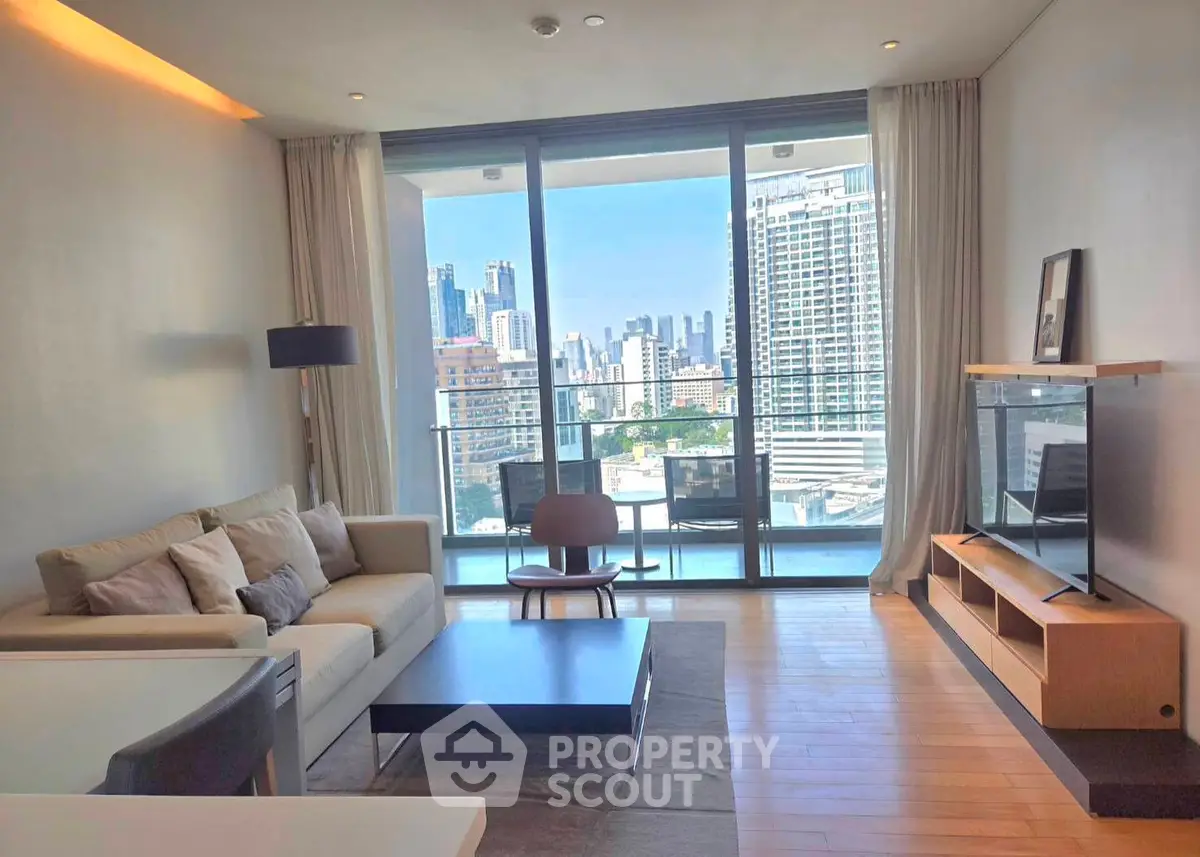 Modern living room with stunning city view and elegant furnishings