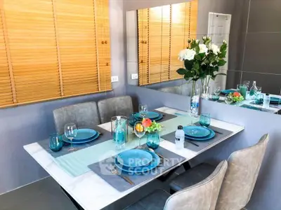 Elegant dining area with modern decor and stylish table setting