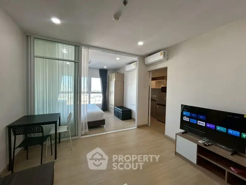 Modern studio apartment with open layout and natural light