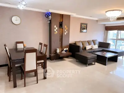 Spacious modern living room with elegant dining area and city view, featuring stylish furniture and chic lighting.