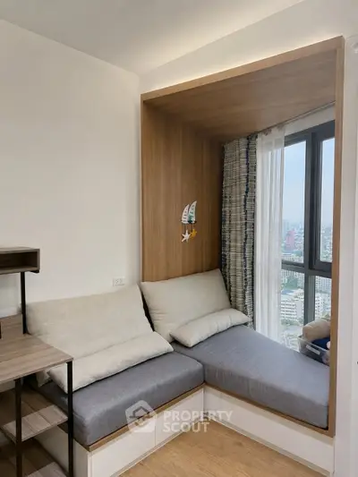 Cozy corner seating with city view in modern apartment