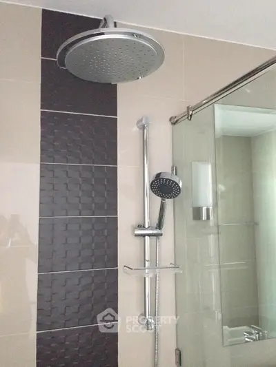Modern bathroom with dual shower heads and glass enclosure