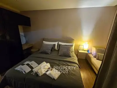 Cozy bedroom with stylish decor and ambient lighting