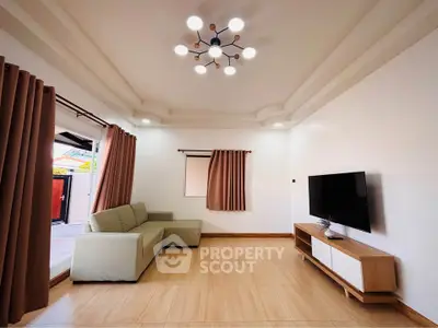 Modern living room with stylish lighting and sleek furniture