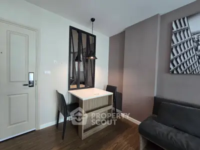Modern living room with stylish decor and cozy seating area, perfect for relaxation and entertaining.