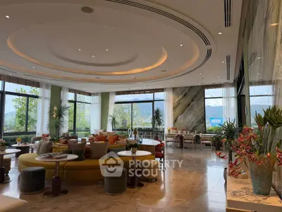 Luxurious modern living room with panoramic windows and elegant decor