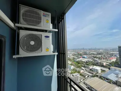 Stunning high-rise balcony view with cityscape and air conditioning units, perfect for urban living.