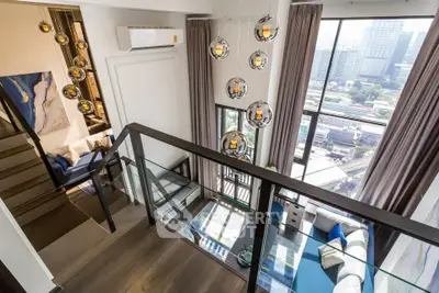 Luxurious duplex living room with stunning city view and modern lighting