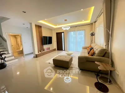 Luxurious modern living room with elegant lighting and plush seating