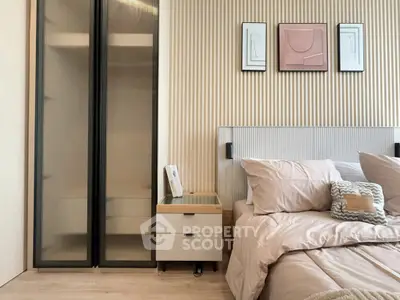 Modern bedroom with stylish decor and cozy bedding