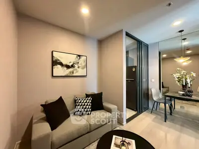 Modern living room with stylish decor and open dining area