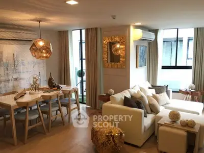 Luxurious modern living room with elegant decor and ample natural light