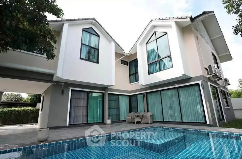 Luxurious modern house with private pool and spacious outdoor area, perfect for family living.