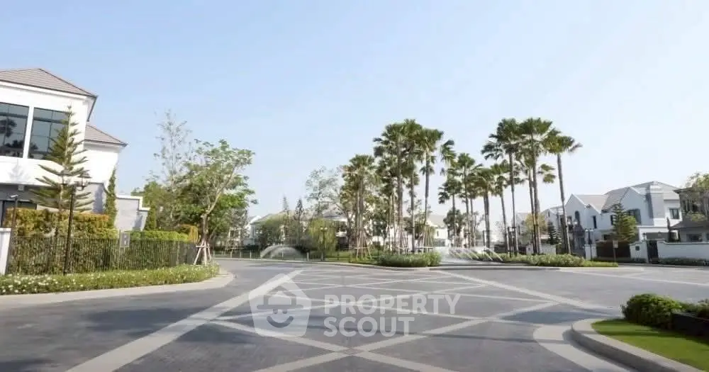 Luxurious residential neighborhood with modern houses and lush landscaping