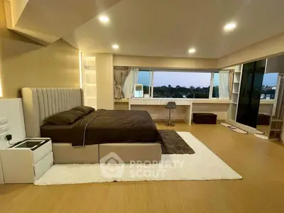 Luxurious bedroom with panoramic window and modern decor