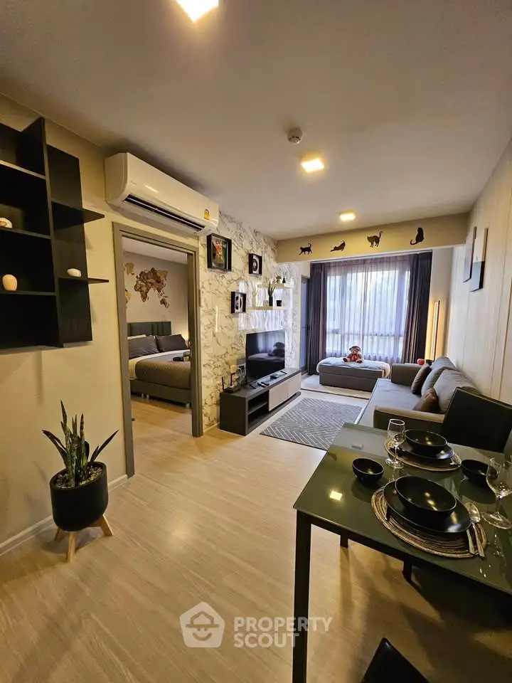 Modern living room with stylish decor, open layout, and cozy ambiance in a contemporary apartment.