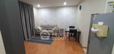 Cozy living room with modern decor and stylish furniture in a contemporary apartment.