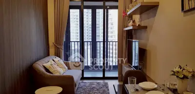 Modern living room with balcony view in urban apartment