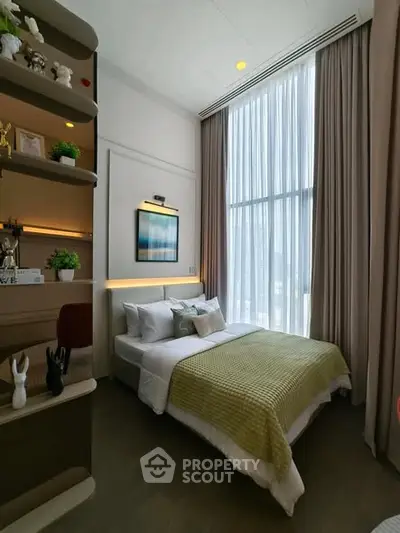 Modern bedroom with high ceiling and large window, elegant decor