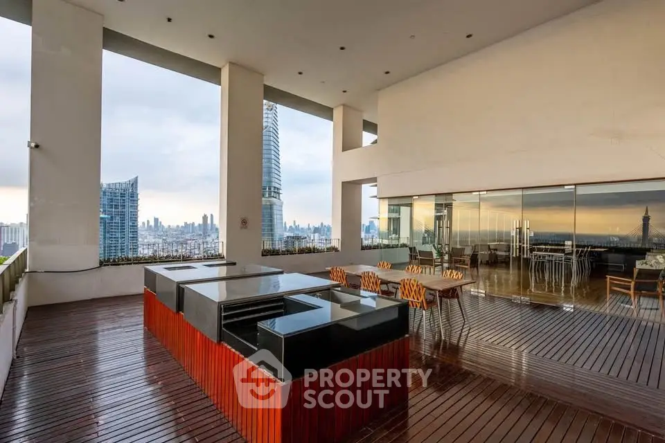 Luxurious rooftop with stunning city views and modern outdoor dining area.