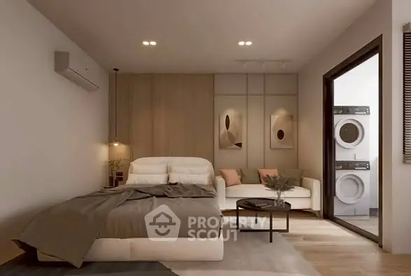 Modern bedroom with stylish decor and in-unit laundry facilities.
