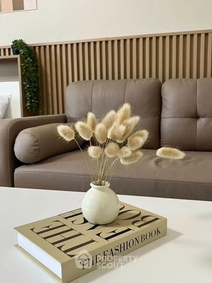 Stylish living room with modern decor and elegant sofa, perfect for contemporary living.