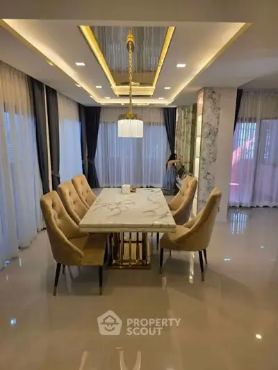 Modern living room with stylish ceiling design and ambient lighting